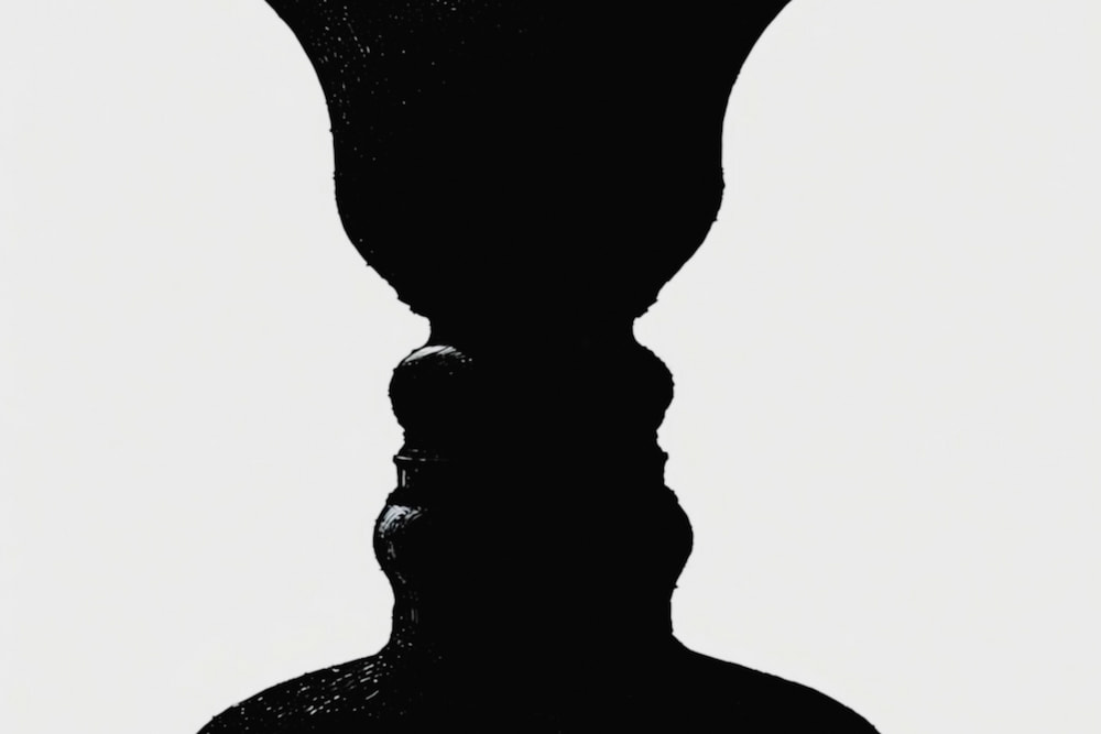 Fragments of a shattered red orb glowing faintly in the darkness