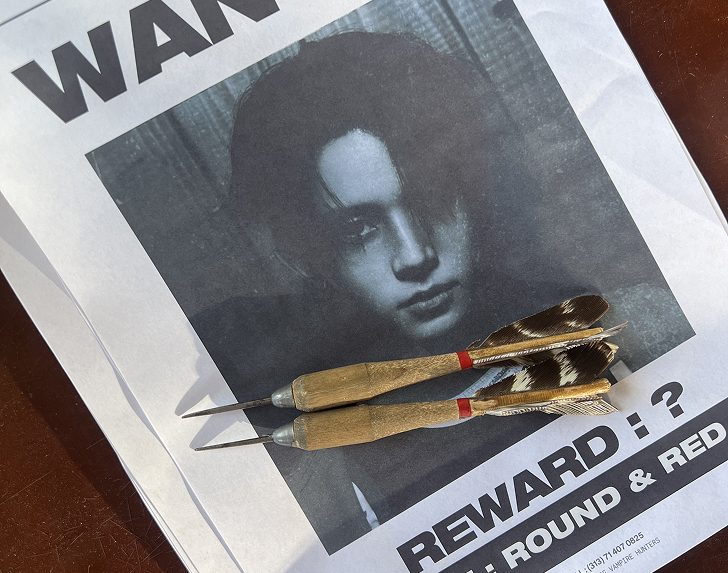 A worn, hand-drawn map spread across an evidence table, marked with red escape routes and circled cave entrances.